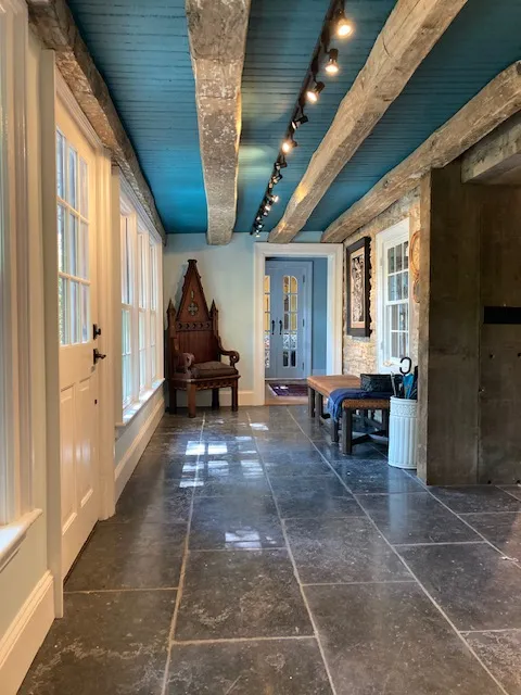 Modern rustic hallway with exposed beams