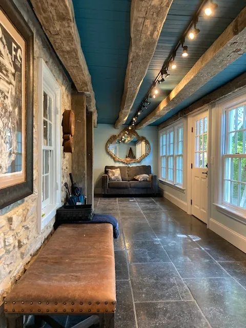 Industrial-style corridor with stone walls