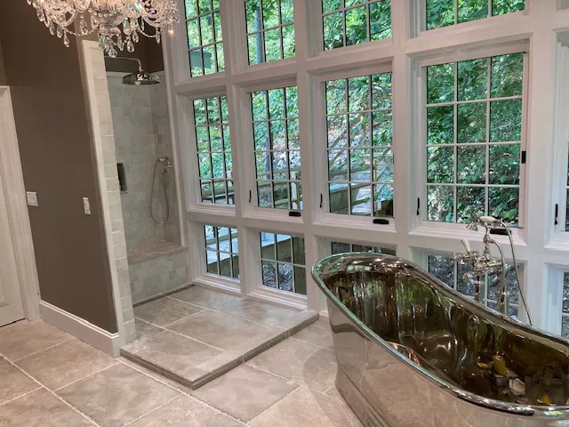 Bathroom with panoramic windows and soaking tub