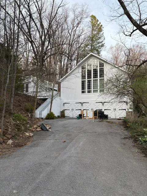 White carriage house garage