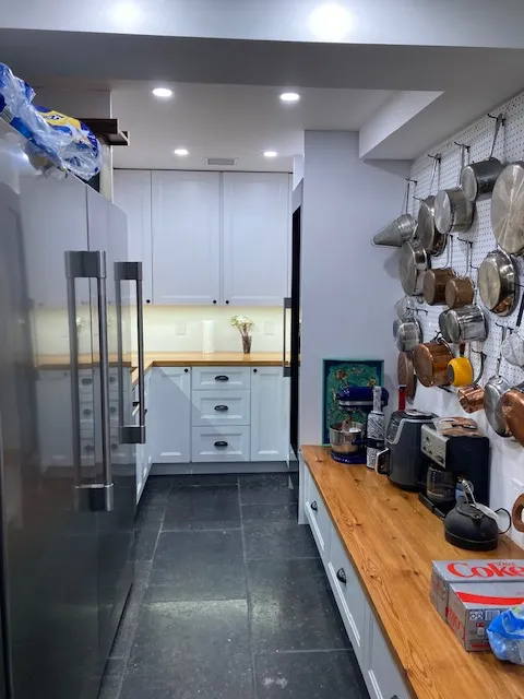 Galley kitchen with organized cookware